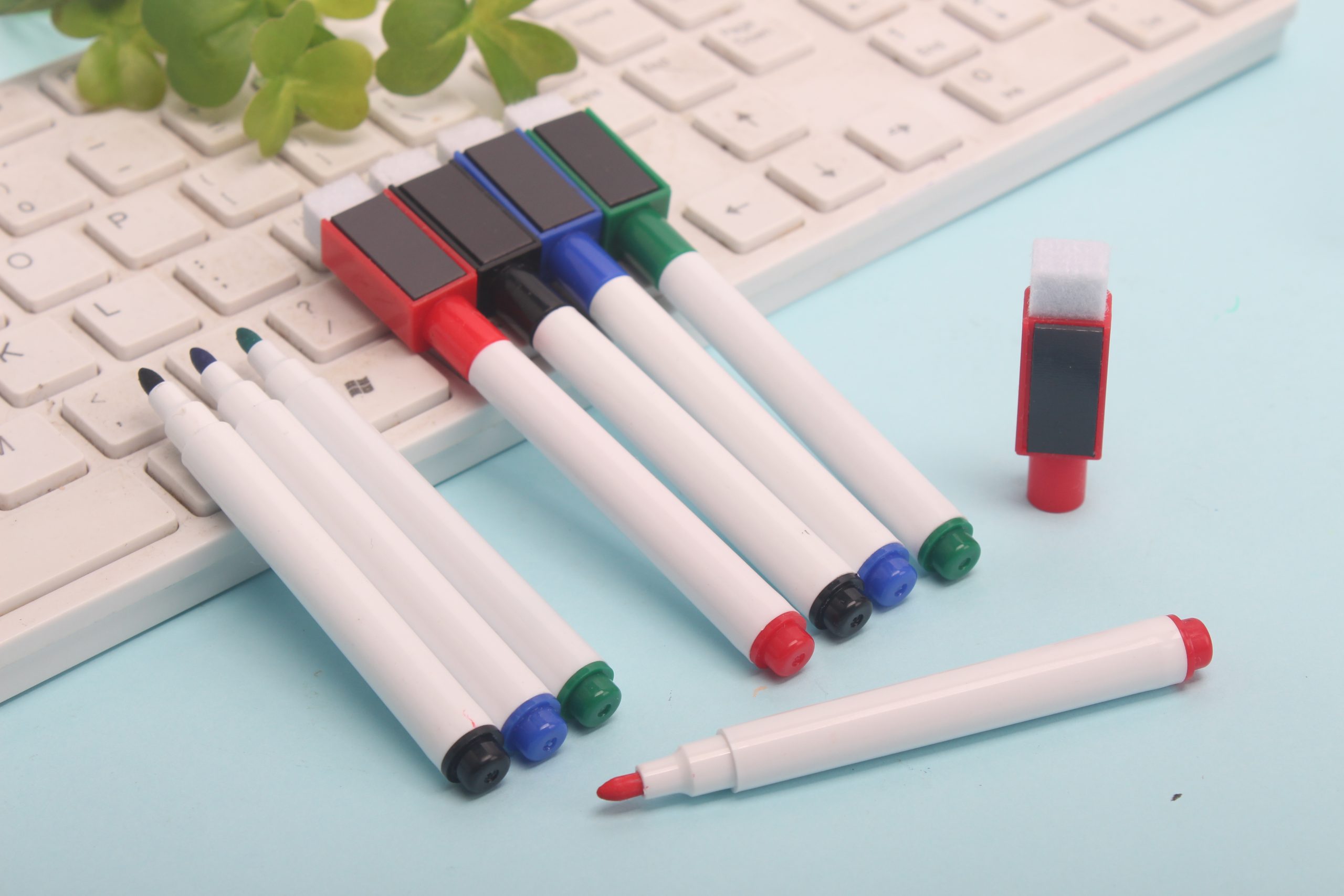 Erasable whiteboard marker with eraser cap Erasable whiteboard marker with eraser cap